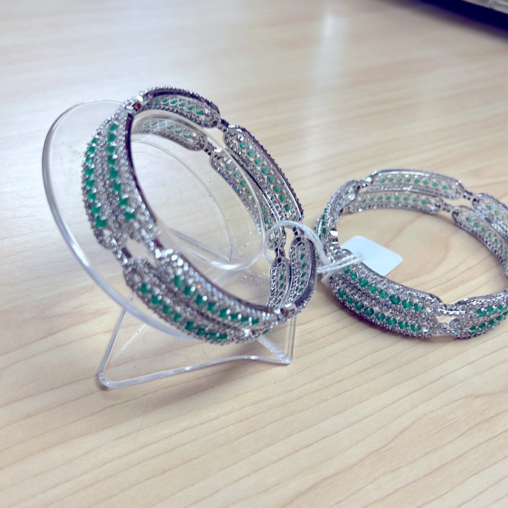 Silver bangle set of 4 with cubic zirconia and green stones - medium (2.375 in)